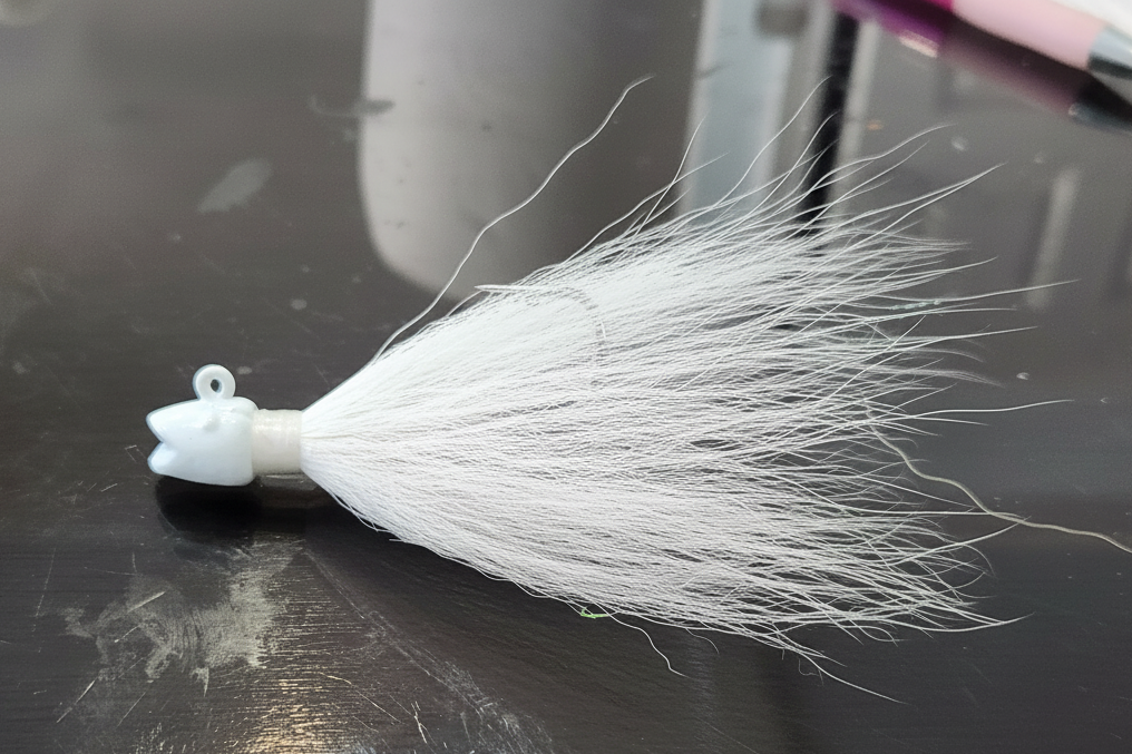 Smiling bill White bucktail jig